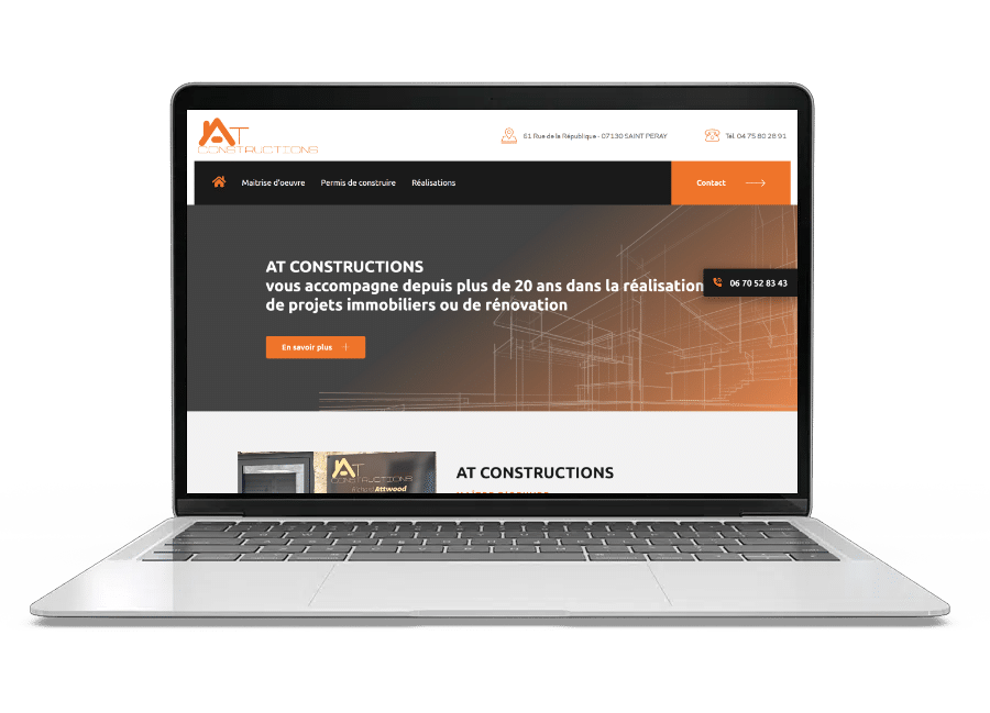 Aperçu du site internet d'AT Constructions sur un ordinateur portable
